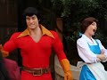 Gaston surprises and holds Belle