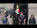 Two Tourists got SHOUTED at by the King's Guard for leaning on his BOOTS!