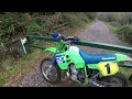 1988 KX500 fouls a plug.