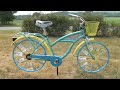 Margaritaville beach cruiser bicycle, yard art.