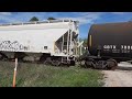 Couplers Shift over a Dip in the Rails under this ELS freight train