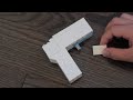 How to build a lego gun that shoots rubberbands.