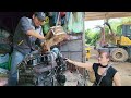 Genius girl modifies the engine of an excavator.