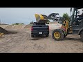 how much dirt can your Chevy or GMC Truck carry john deere 324L in action