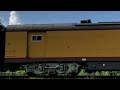 UP 4014 passes by 1442 in Orange Texas with Lynn Nystrom car shown