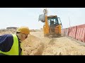 JCB 3DX backhoe working excavation for new installation LT electrical cable