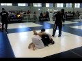 Boy and girl grapple at mma tournament