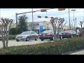 Sign Girl Fights high winds