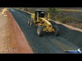 The greatest road-building site, complete with compactors & a KOMATSU motor grader spreading Gravel