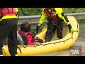 Toronto floods: Emergency crews rescue driver stranded on top of car