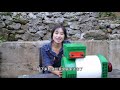 The mountain girl repairs a generator that has been damaged for 20 years