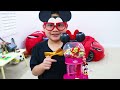 Lyndon and Jannie Pretend Play with Magic Mickey Mouse and Elsa Gumball Machine Toys Video for Kids