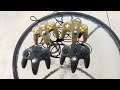 Custom painted carbon fiber BATMAN & ZELDA N64 controllers black and yellow