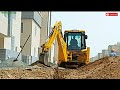 JCB 3DX backhoe loader working excavation