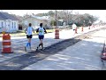 Austin Marathon 2010 - Darlene & Liz running along a bad stretch of road
