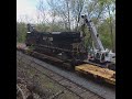 Wrecked engines from the 19G derailment being loaded onto flatcars!