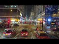 Hong Kong during the night, sitting on a double-decker bus