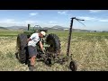 Two John Deere Model A Tractors and Numbers 5 and 38 Mowers Side-By-Side