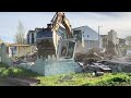 How to Demolish a Cinder Block House with a Caterpillar Excavator