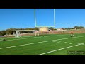 Punting a football through the field goal