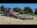 baling hay JUNE 2023. on the Eden Project  site in Cornwall  with Ben Crocker