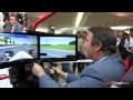 Nigel Mansell playing F1 racing video game