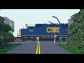 CSX GP40-2 6457 pulls its train up the 2.1% Grade and over E Benson Street with a longer train