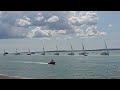 Clipper round the world race boats sailing into Portsmouth at the end of the race