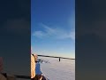 WALKING ON FROZEN LAKE