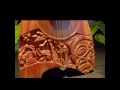Hand Carved Ukulele, tiki theme.wmv