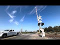 (CPKC) - CP 9708 Leads UP Grain Train w/ KCSM North - E. Armstrong Road Railroad Crossing, Lodi CA