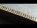 Kerfing laminated chipboard to bending