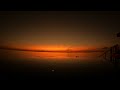 Time-lapse of an amazing sunset with few clouds and a calm sea in Maldives [4k]