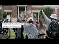 Counter-protester appears to make racist gesture towards pro-Palestinian rally