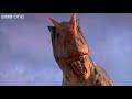 A deadly Allosaurus ambushes its prey | Planet Dinosaur - BBC