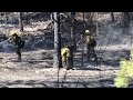 Firefighters mopping up the Rimrock Fire