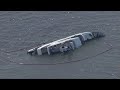 YACHT OVERTURNS ON CHESAPEAKE