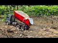 rc truck. rc excavator. rc dump truck. scoop sand onto large trucks..transport sand by dump truck