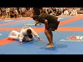 teenage boy submitted at grapplers quest by triangle choke