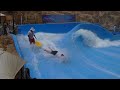 Kid falls off artificial wave