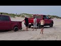 Stuck in the sand at San Luis Pass. Jeeps, Fords, Chevys, all stuck.