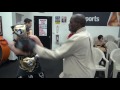 Roger Mayweather holding pads for fellow trainer