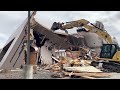 Demolishing a Huge Bank with a Caterpillar Excavator