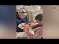 Baby Is Trying To Bite Dad's Toe Off