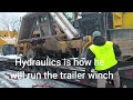 Unloading MOW Equipment off a Tractor Trailer Truck