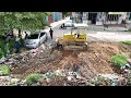 New Project Good Working Dump Truck Unloading Soil Filling Land Bulldozer Komatsu Dozer D31P Pushing