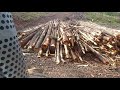 Log truck driving on the yarder side with a steep switchback