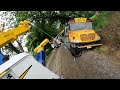 ROAD GIVES WAY UNDER A SCHOOL BUS!!!  BOTH OUR 50 TONS WORK TOGETHER!!!