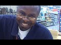 black guy smiling with glasses