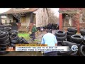 Community rallies to clean up dumped tires in their neighborhood